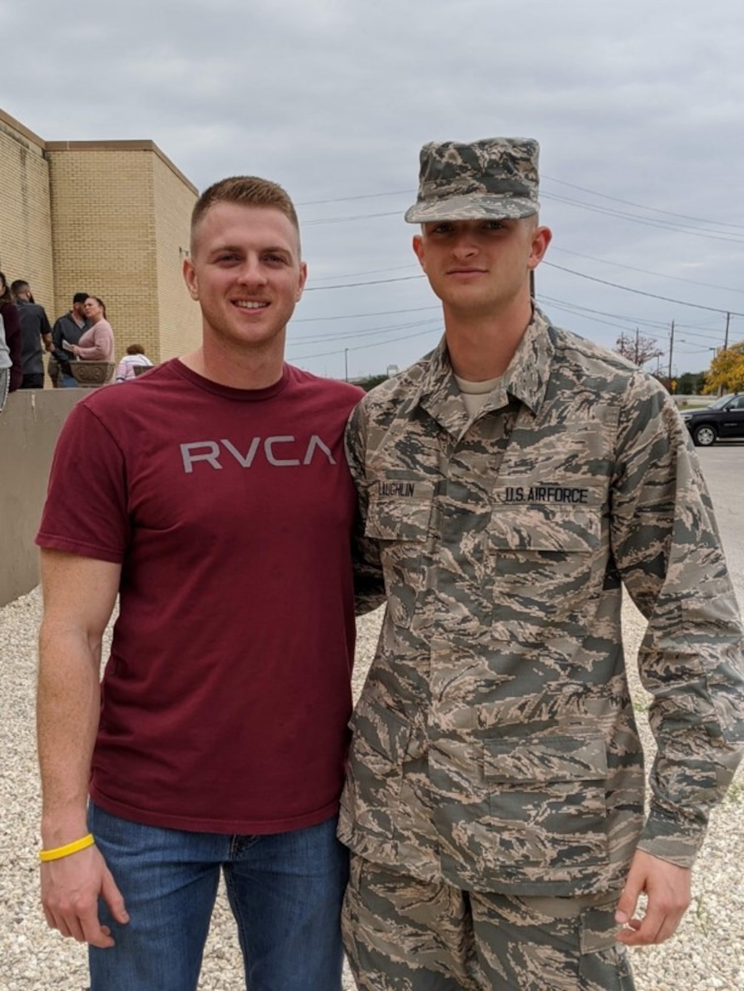 Airman 1st Class Justin Laughlin, right, poses with his brother Staff Sgt. Cody Laughlin.