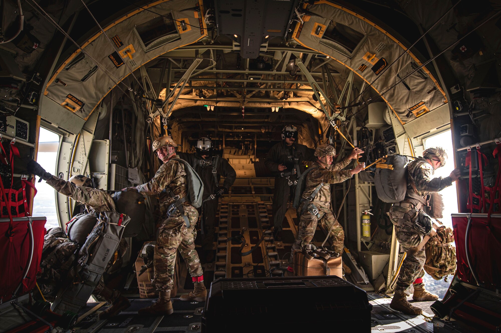 Photo of soldiers preparing to conduct a combat equipment jump.