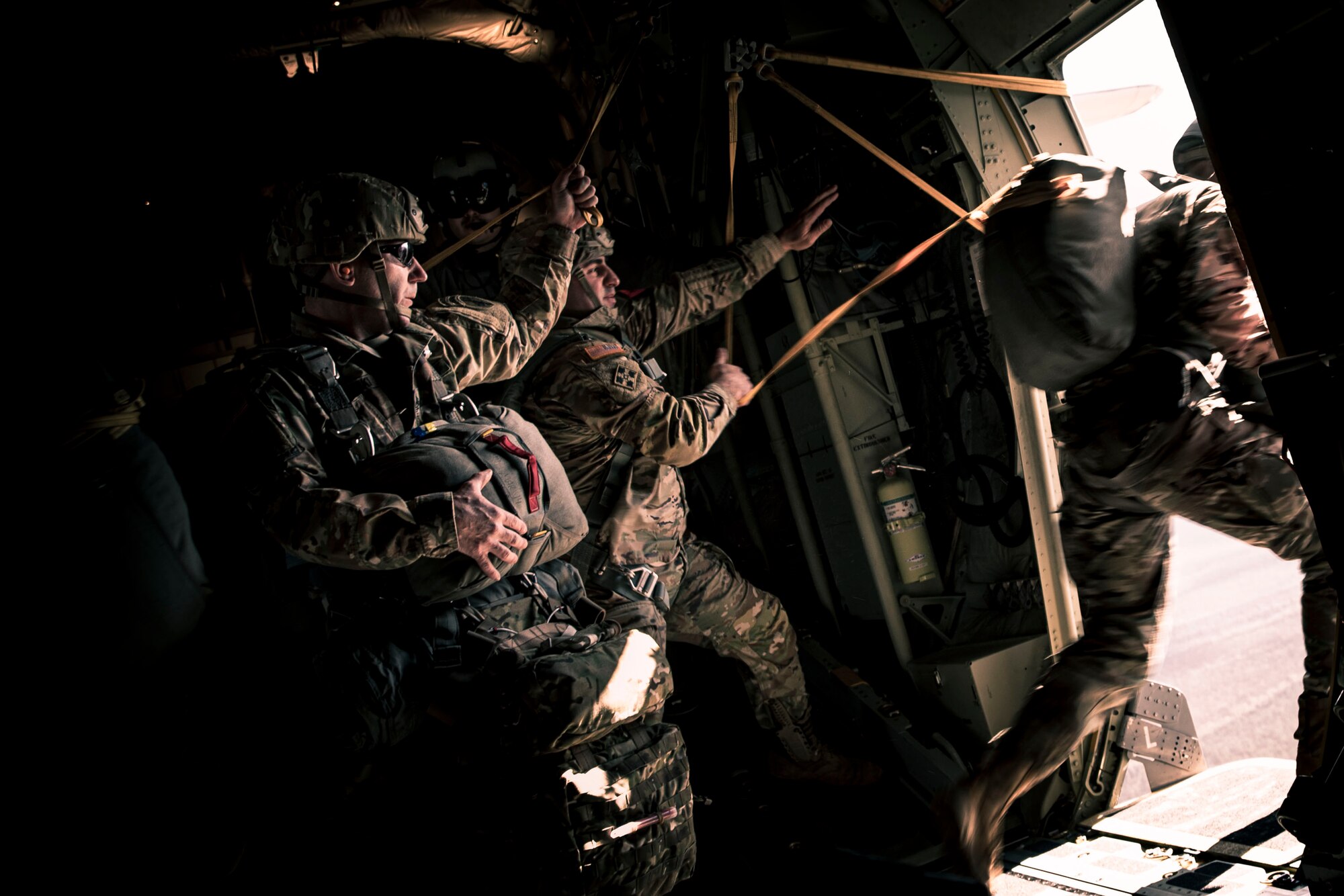 Photo of soldiers conducting a combat equipment jump.