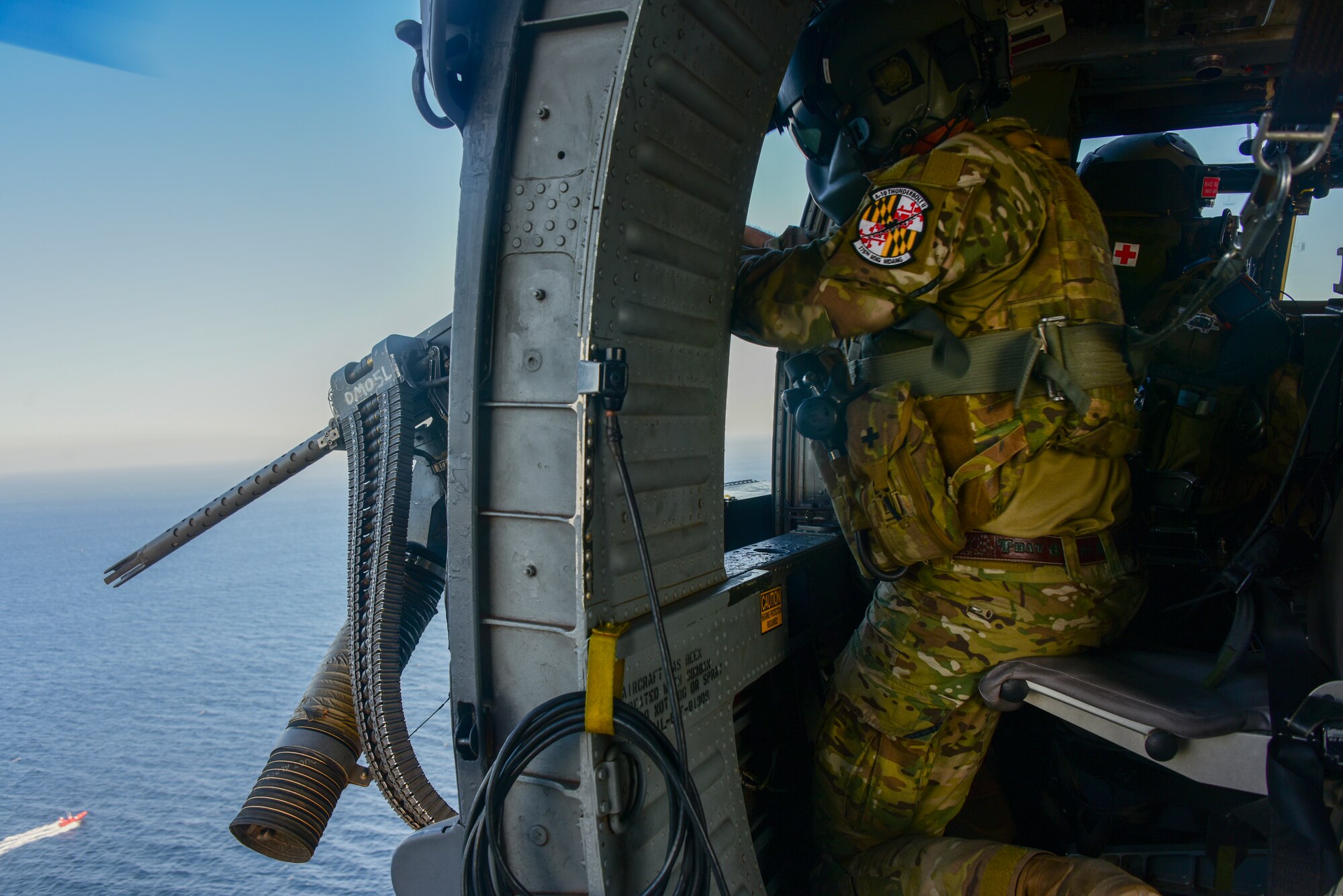 A photo of an Airman shooting a gun.