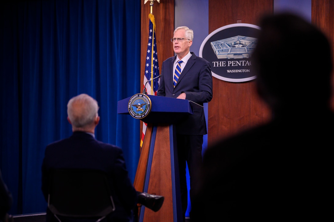 Acting Defense Secretary Christopher C. Miller speaks at a podium.