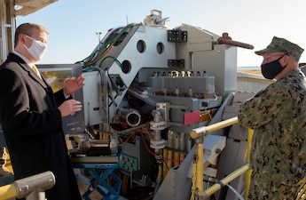 (Nov. 17, 2020) - Chief of Naval Operations (CNO) Adm. Mike Gilday receives a brief on directed energy at Naval Surface Warfare Center (NSWC) Dahlgren, Virginia, Nov. 17. CNO traveled to Dahlgren to visit Sailors and civilians and receive briefs on a variety of programs like High Energy Lasers, Solid Laser Technology Maturation (SSL-TM) and Layered Laser Defense (LLD).  (U.S. Navy photo by Lieutenant Rachel Maul/Released)