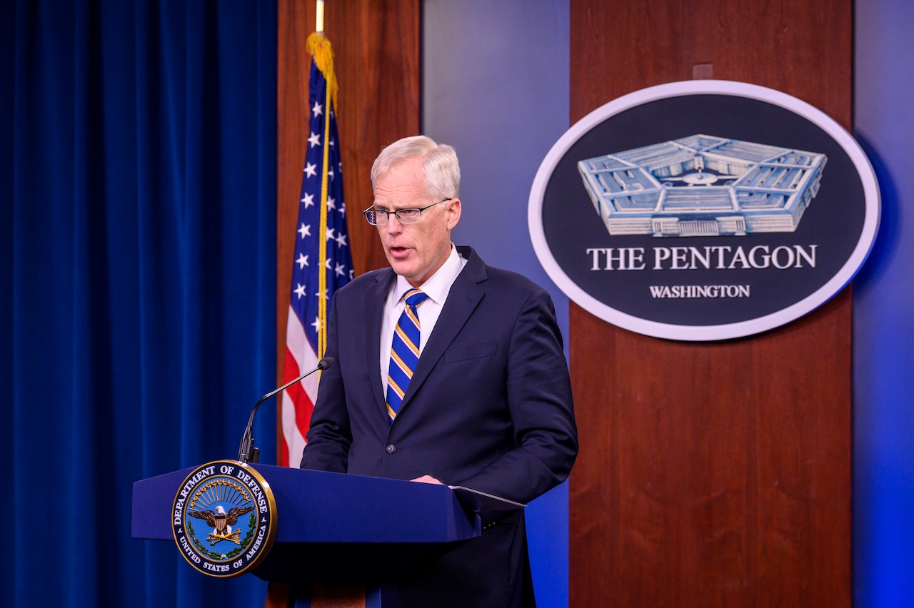 Acting Defense Secretary Christopher C. Miller speaks at a podium.