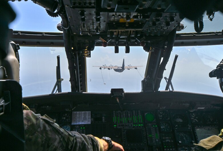 HC-130J Refuels HH-60G Pave Hawk Helicopters