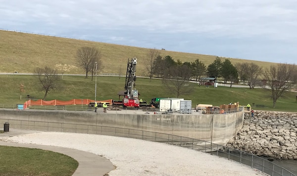 A contractor prepares to begin repair work on the outlet channel at Saylorville Lake.