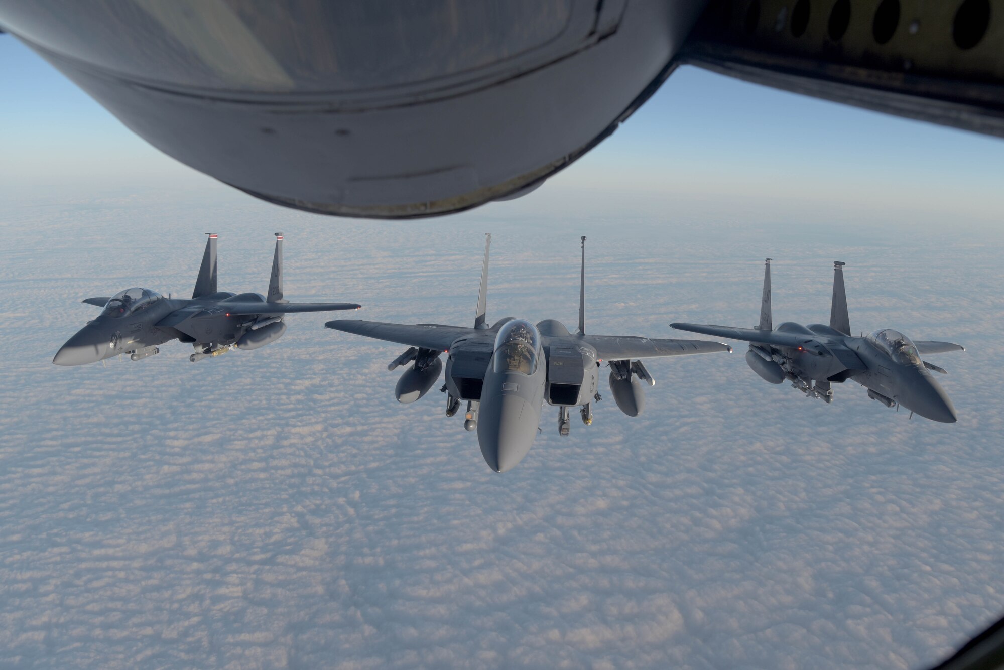 F-15 Strike Eagles flying in formation
