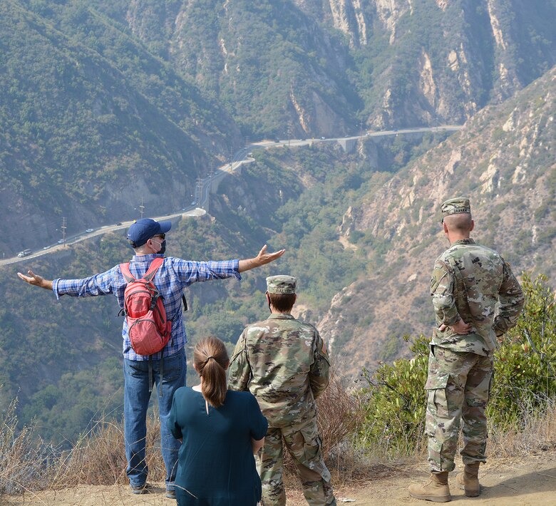 Jim Hutchison, U.S. Army Corps of Engineers Los Angeles District lead planner for the Malibu Ecosystem Restoration Project, far left, discusses plans for the project with Maj. Gen. William “Butch” Graham, deputy commanding general for civil and emergency operations, U.S. Army Corps of Engineers Headquarters, far right, during an Oct. 6 site tour of the project near Calabasas, California. Lt. Gen. Scott Spellmon, the Corps’ commanding general and 55th U.S. Army chief of engineers, signed the chief’s report for the project Nov. 13 at the Corps’ headquarters in Washington D.C., which now elevates the report to the Assistant Secretary of the Army for Civil Works, U.S. Office of Management and Budget, and to Congress for consideration of project authorization.