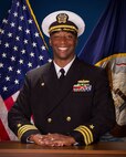 Studio portrait of Cmdr. Christopher J. Carroll.