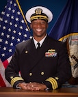 Studio portrait of Cmdr. Christopher J. Carroll.