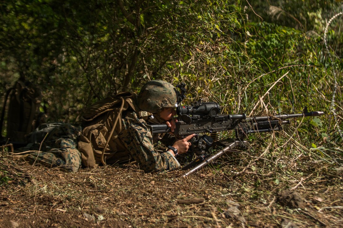 A U.S. Marine posts security during a Marine Corps Combat Readiness Evaluation at Camp Fuji, Japan, Oct. 29.