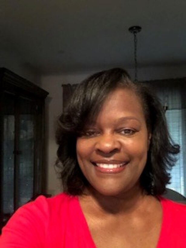 A smiling woman.
