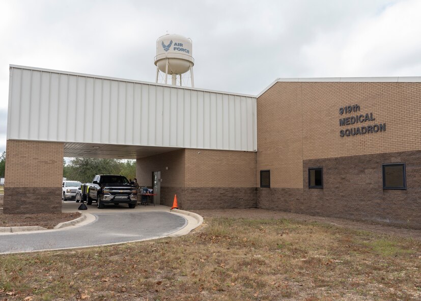 Photo of truck parked at drive-thru flu line at the medical squadron building