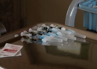 Photo of flu shots sitting on a tray
