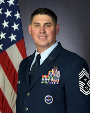 Official photo of CMSgt Jason Delucy