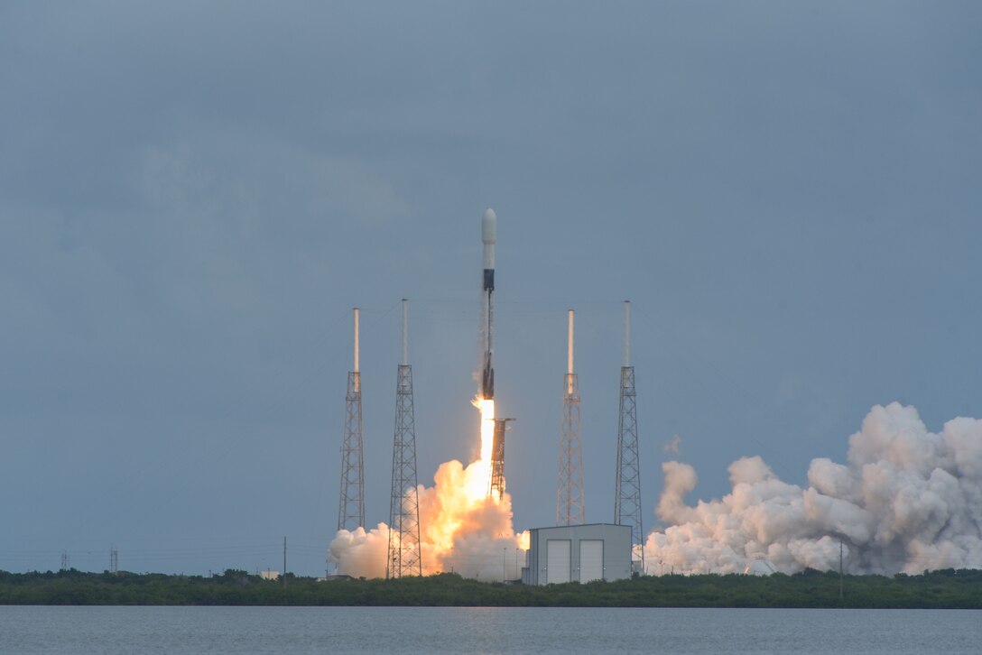A rocket blasts off.