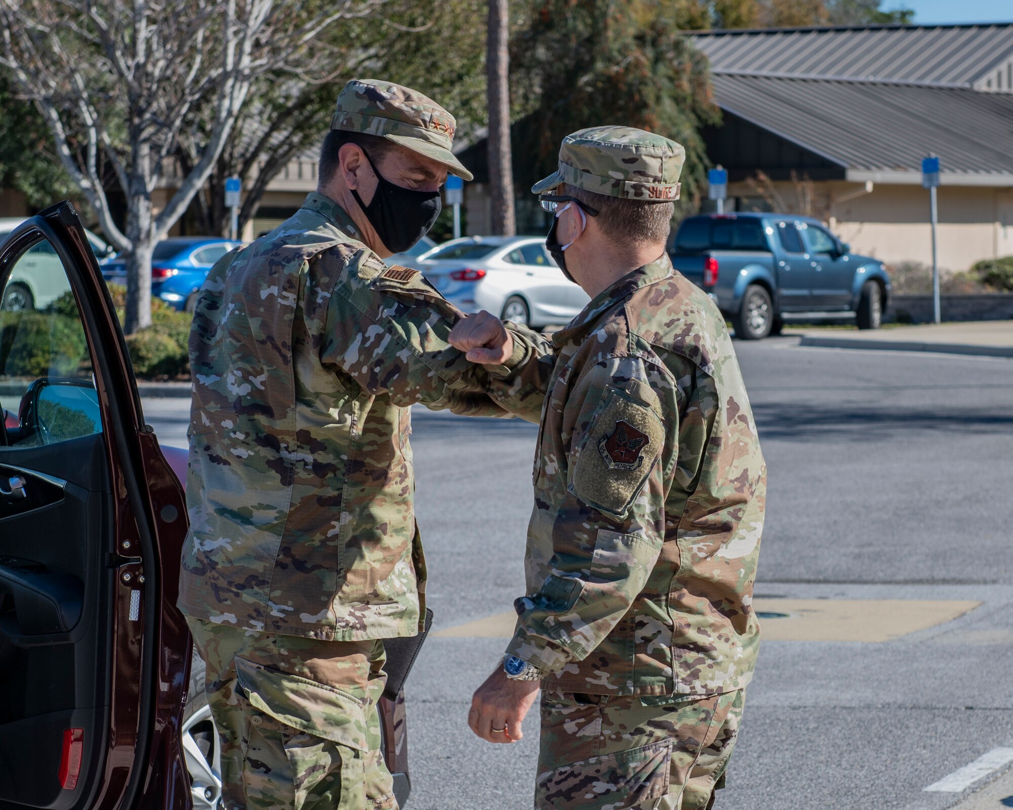 U.S. Air Force Lt. Gen. Jim Slife, left, commander of Air Force Special Operations Command, speaks with U.S. Air Force Lt. Gen. Michael Loh, director of the Air National Guard, during a base visit on Hurlburt Field, Florida, Nov. 18, 2020.