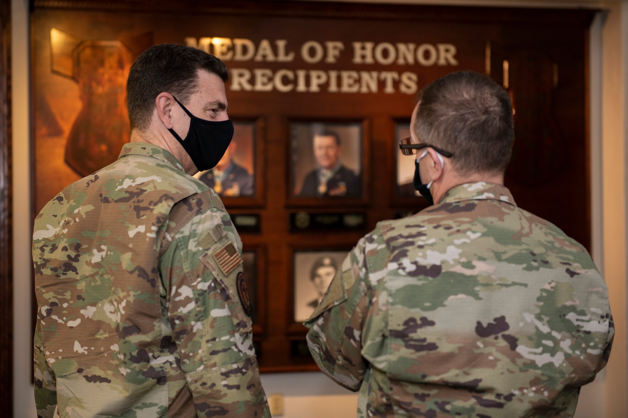 U.S. Air Force Lt. Gen. Jim Slife, left, commander of Air Force Special Operations Command, speaks with U.S. Air Force Lt. Gen. Michael Loh, director of the Air National Guard, during a base visit on Hurlburt Field, Florida, Nov. 18, 2020.