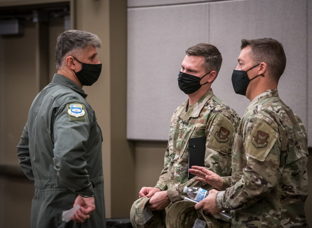 Col. Glenn Collins, 932nd Airlift Wing commander, chats with visiting Team Scott members from the 42nd Cyber Operations and 960th Cyberspace Wing during a meet and greet Nov. 13, 2020, Scott Air Force Base, Illinois.  (U.S. Air Force photo by Christopher Parr)