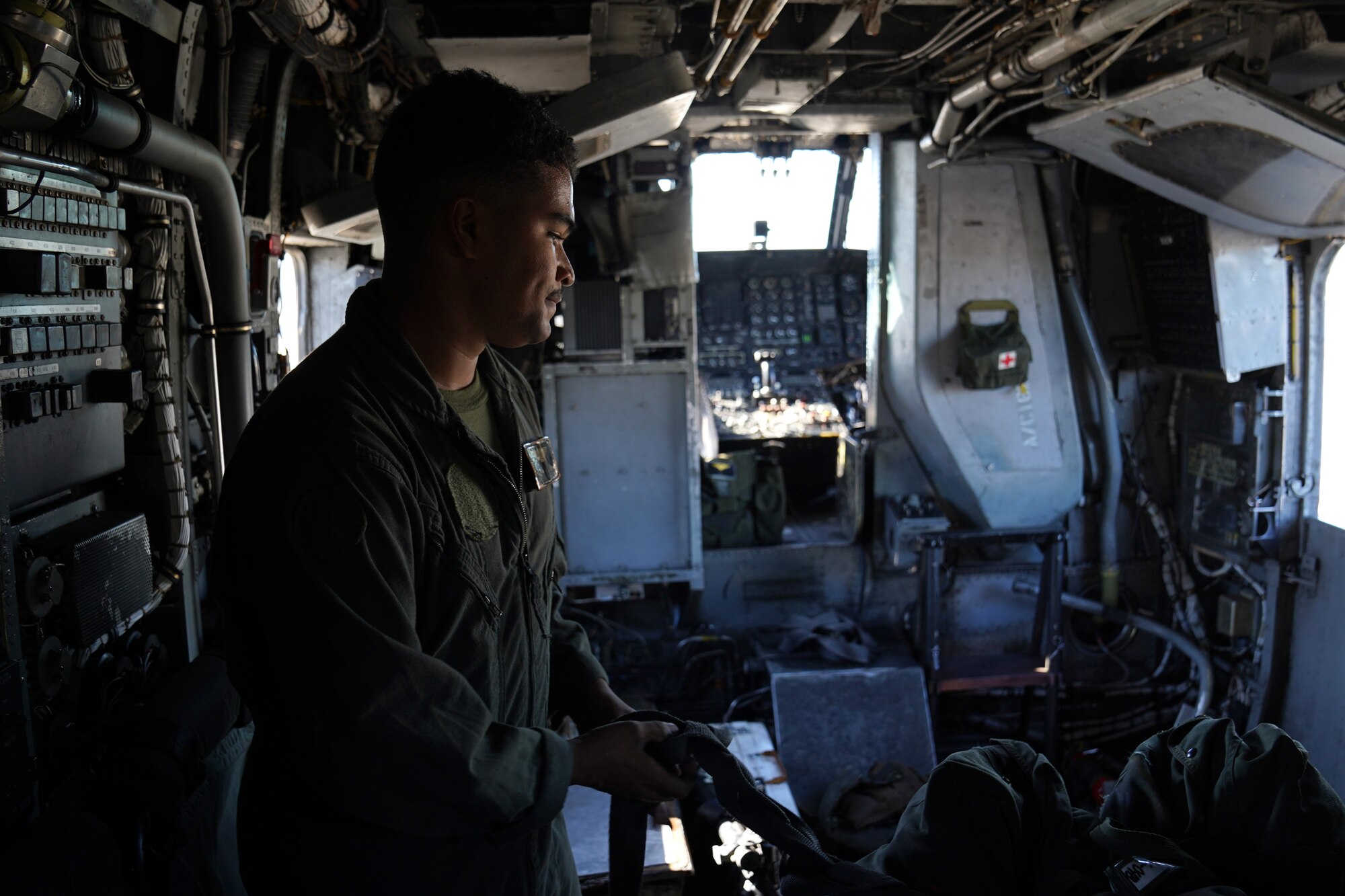 U.S. Marine Corps Cpl. Ramiro Murillo, Marine Heavy Helicopter Squadron 464 air frames mechanic, Marine Corps Air Station New River, North Carolina, inspects equipment inside a Sikorsky CH-53E Super Stallion on the flightline at Keesler Air Force Base, Mississippi, Nov. 17, 2020. Marines came to Keesler to conduct routine training operations in and around the Mississippi area. (U.S. Air Force photo by Airman 1st Class Seth Haddix)