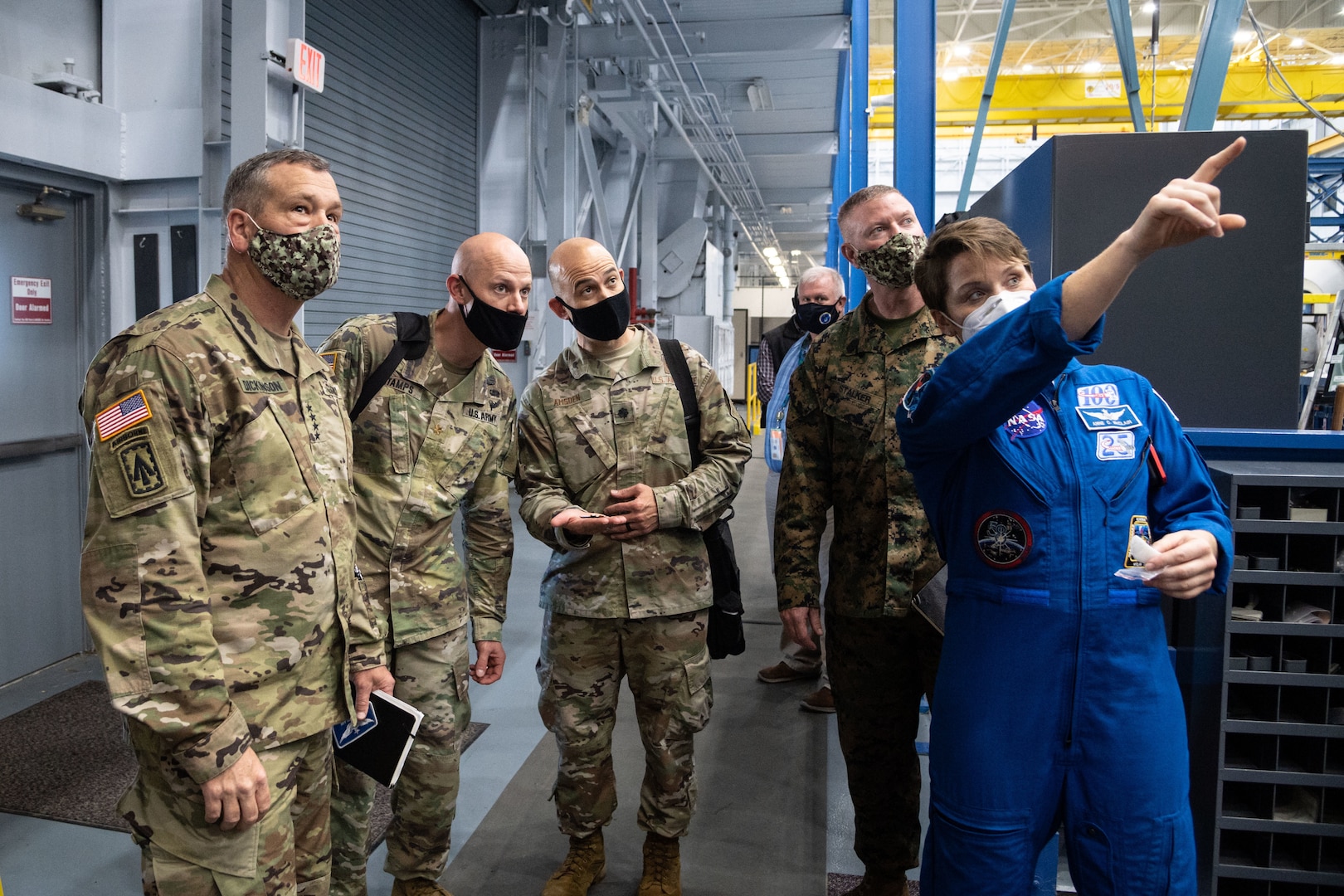 Astronaut gives tour to U.S. Space Command personnel.