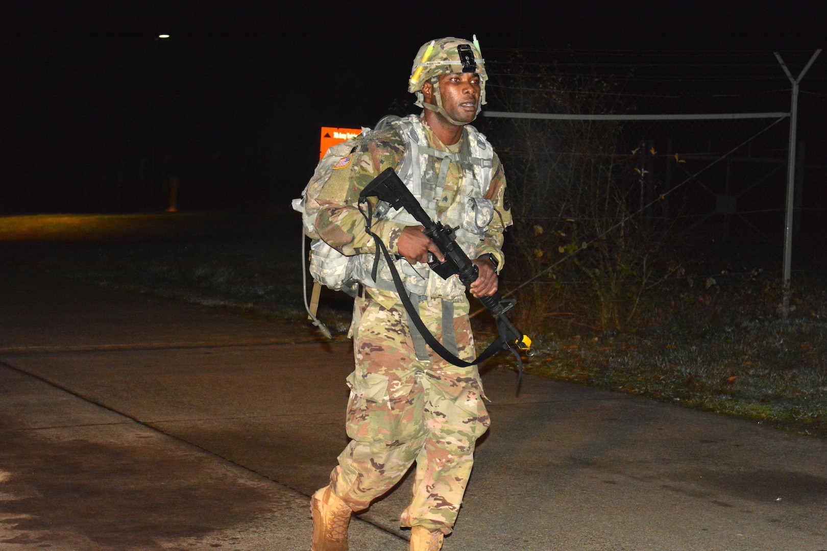 Sgt. James Gabisum, assigned to Landstuhl Regional Medical Center, completes the road march portion of the Regional Health Command Europe Best Warrior competition Nov. 3 and 4 in Baumholder.  Gabisum was the winner in the 'noncomissioned officer' category.