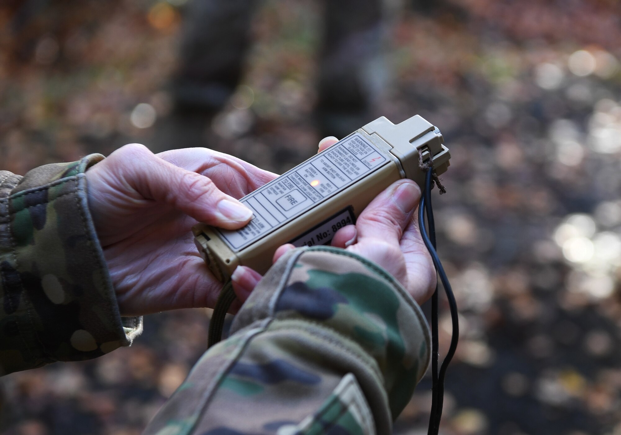 person holds electronic device