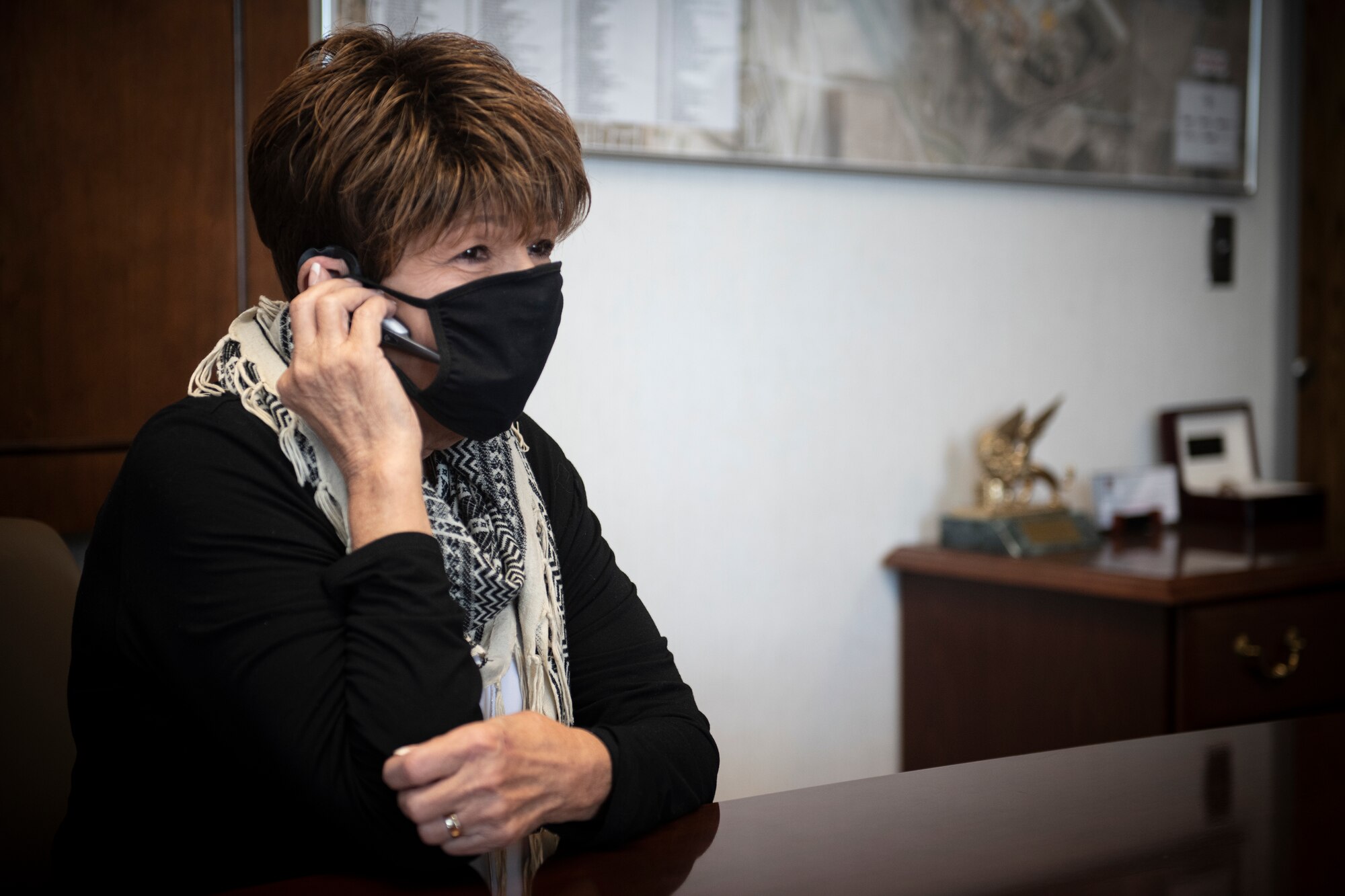 woman speaks on phone