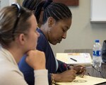 A participant of the Women’s Health Transition Assistance Program, takes notes during a tour of the Women’s Center at the James A. Haley Veterans’ Hospital, Tampa, Fla., July 31, 2018. The hospital visit was part of a pilot program series to display the range of women’s health and mental health care services available post-separation.