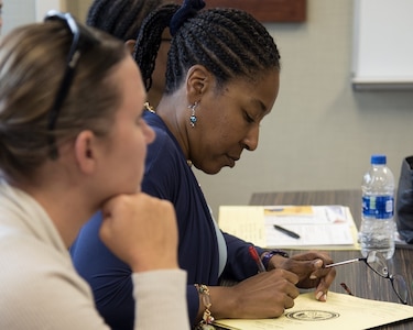 A participant of the Women’s Health Transition Assistance Program, takes notes during a tour of the Women’s Center at the James A. Haley Veterans’ Hospital, Tampa, Fla., July 31, 2018. The hospital visit was part of a pilot program series to display the range of women’s health and mental health care services available post-separation.