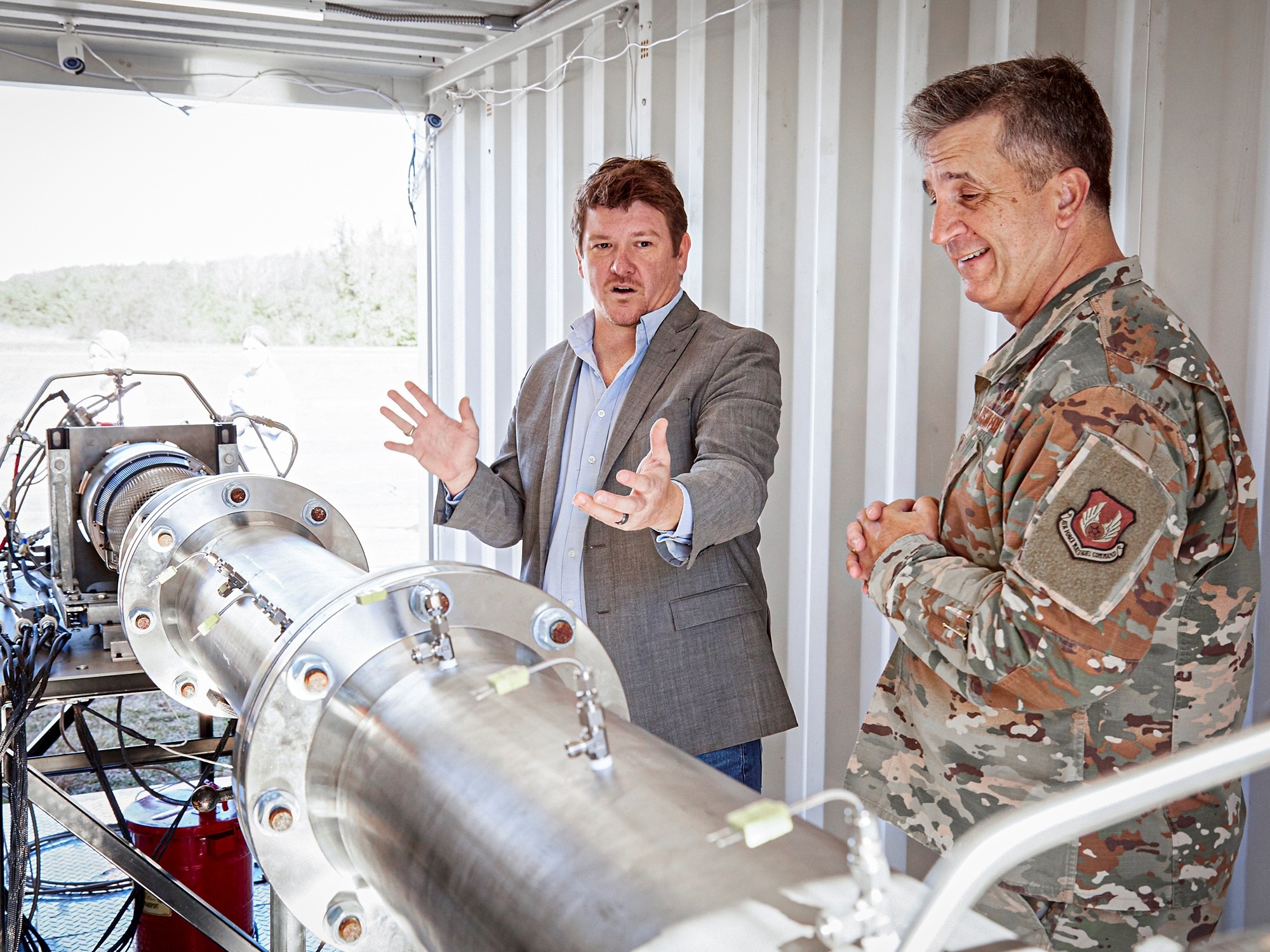Brig. Gen. Ryan Britton, (right) Program Executive Officer of the Presidential and Executive Airlift Directorate, visited Hermeus Corporation on November 13 for a demonstration of the company’s Mach 5 engine. (Courtesy photo)
