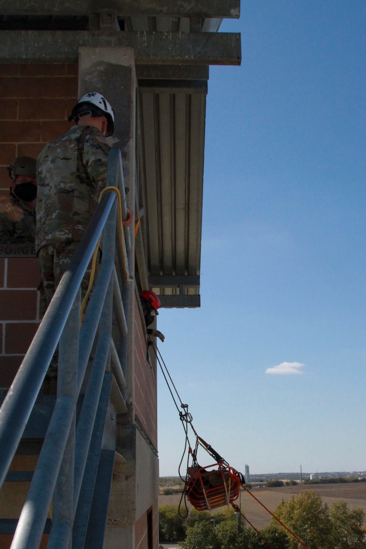 Maj. Gen. David Glaser, U.S. Army North deputy commanding general-operations, observes the Urban Search and Rescue lane at the San Antonio Fire Academy Nov. 5. This lane is part of a larger Civil Support Training Activity training exercise that is employing force health protection measures while conducting training to ensure the safety of service members and those around them.
