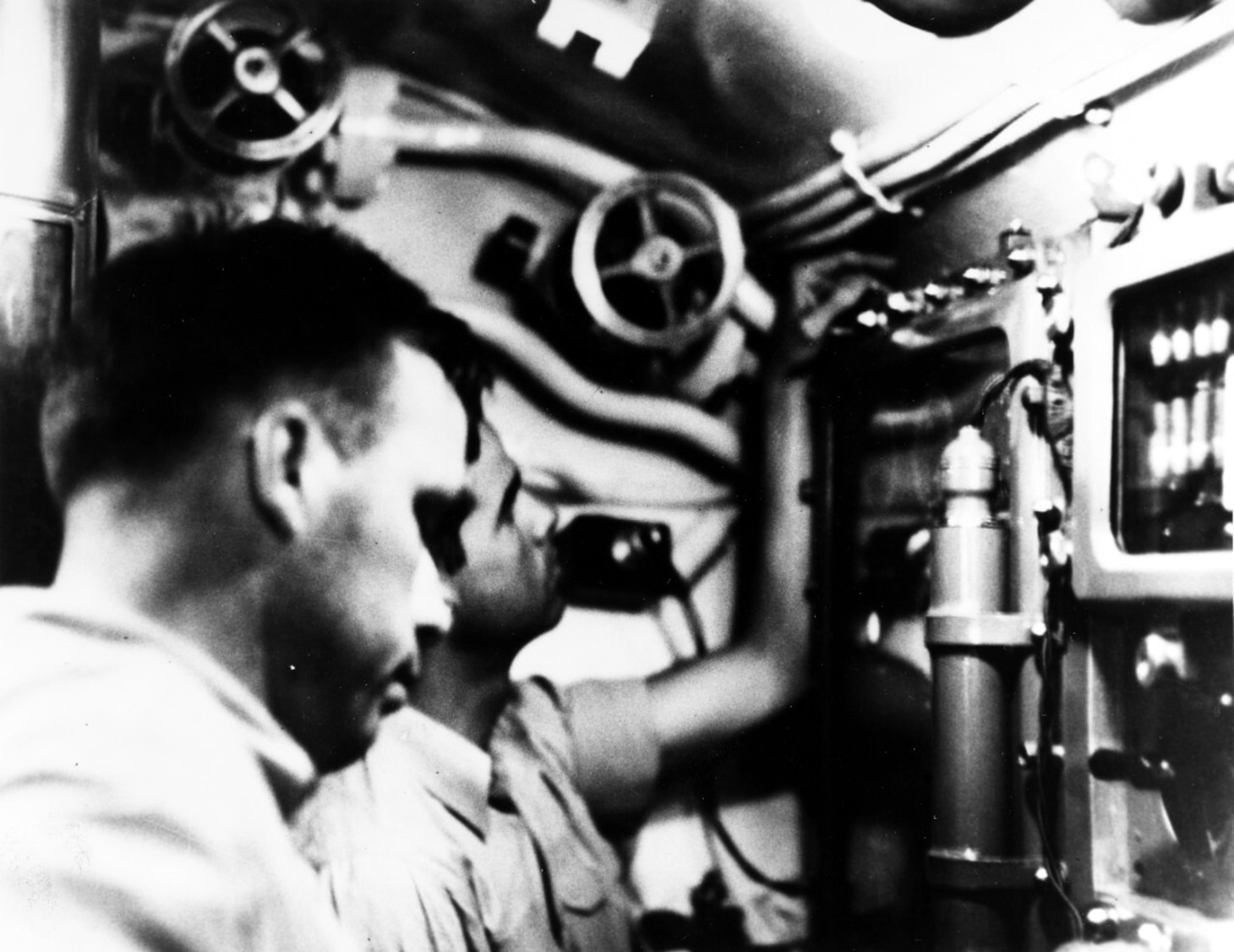 Lt. Cmdr. Dudley W. Morton is seen in the conning tower of USS Wahoo (SS-238) during an attack on an Imperial Japanese convoy north of New Guinea.
