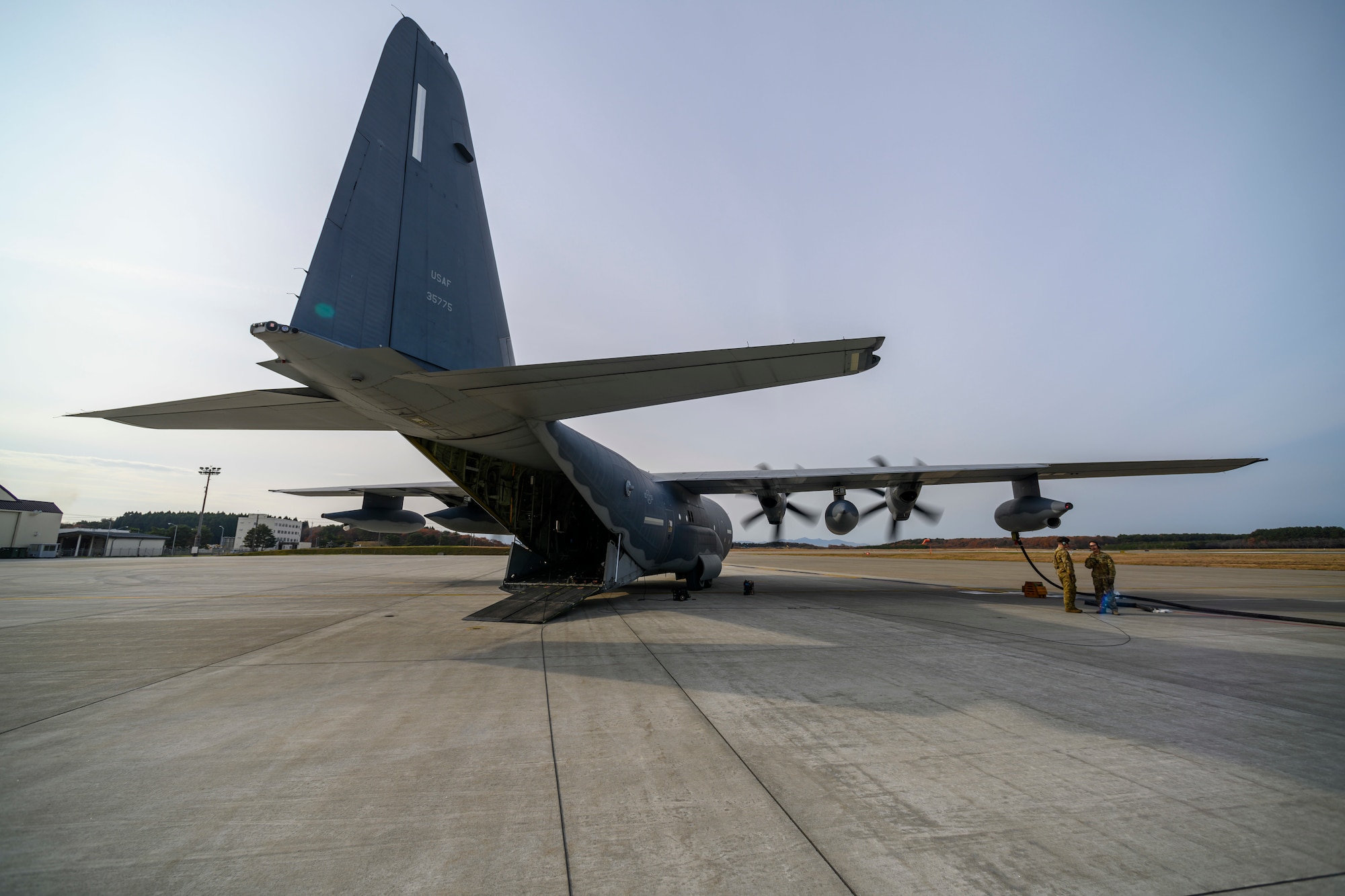 A U.S. Air Force MC-130J Commando II refuels an F-16 Fighting Falcon with its engines on during a forward area refueling point training (FARP) exercise at Misawa Air Base, Japan, Nov. 18, 2020. Without FARP capabilities, U.S. Air Force aircraft are limited to air-to-air refueling and permanently-installed bases for their refueling needs. However, when a fighter squadron has FARP support, options are vastly increased, as any accessible airfield or island can be used to replenish fighters and send them back to the fight. (U.S. Air Force photo by Airman 1st Class China M. Shock)