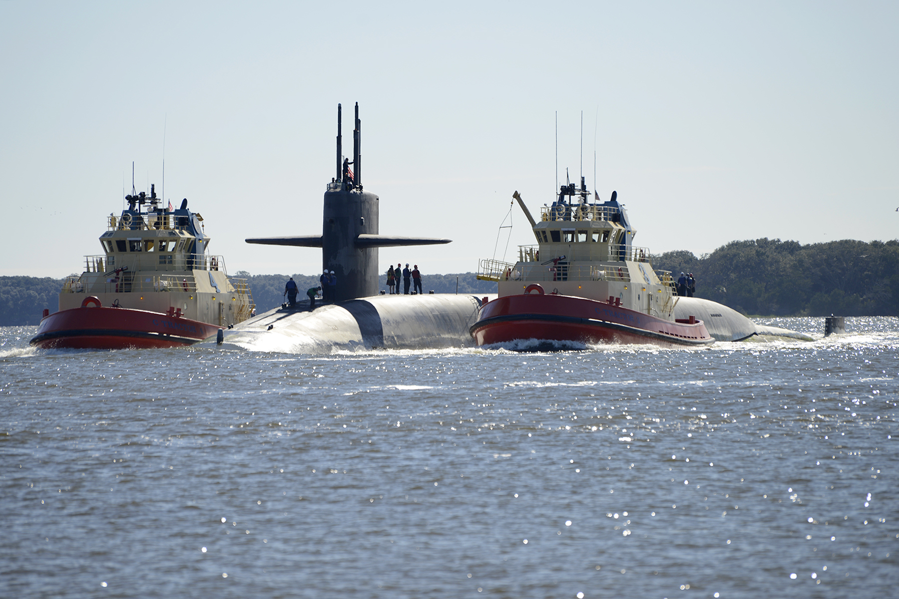 The Ohio-class ballistic-missile submarine USS Tennessee (SSBN 734) (Blue) returns to homeport at Naval Submarine Base Kings Bay, Ga., following a strategic deterrent patrol.