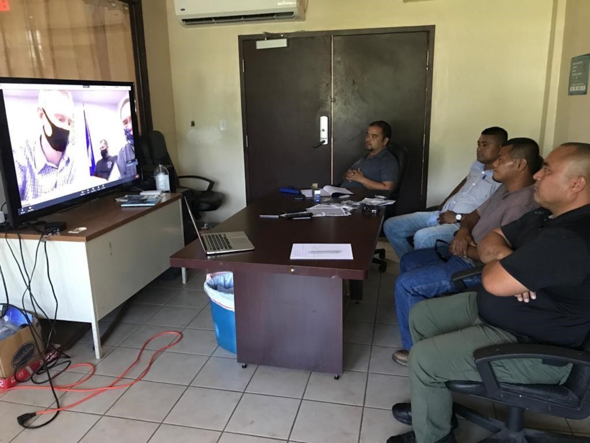 Police from the Federated States of Micronesia attend a virtual subject matter expert exchange with members of Guam's Department of the Air Force Office of Special Investigations in Kolonia, Pohnpei Nov. 17, 2020. OSI and FSM police shared best practices to promote the success of processing drug related cases throughout the Oceania law enforcement community. (U.S. Air Force photo by Staff Sgt. Nicholas Crisp)