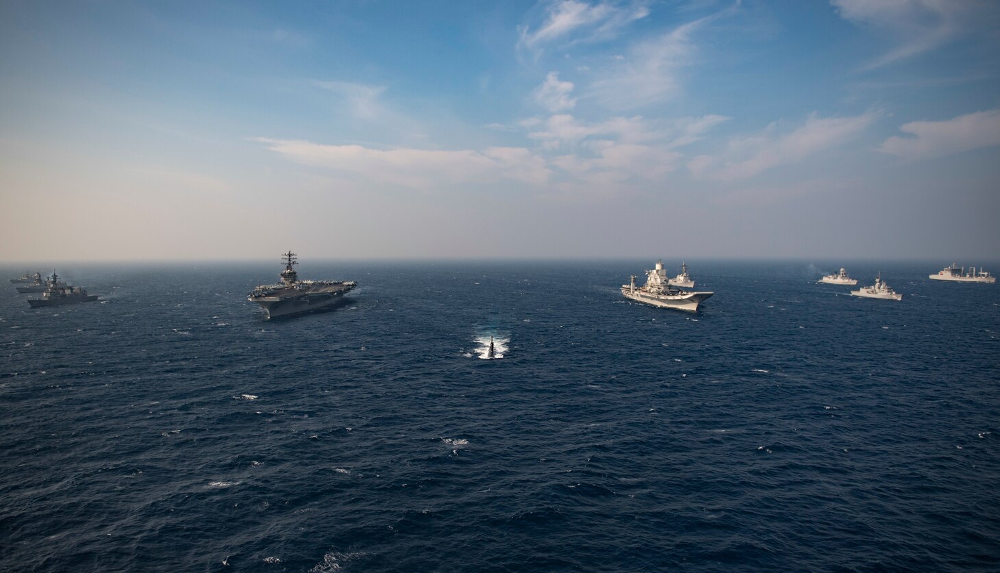 201117-N-NH257-1295 NORTH ARABIAN SEA (Nov. 17, 2020) Ships from the Royal Australian Navy, Indian Navy, Japanese Maritime Self-Defense Force, and the United States Navy participate in Malabar 2020. Malabar 2020 is the latest in a continuing series of exercises that has grown in scope and complexity over the years to address the variety of shared threats to maritime security in the Indo-Asia Pacific where the U.S. Navy has patrolled for more than 70 years promoting regional peace and security. Nimitz Carrier Strike Group is currently deployed to the 7th Fleet area of operations in support of a free and open Indo-Pacific. (U.S. Navy photo by Mass Communication Specialist 3rd Class Elliot Schaudt/Released)