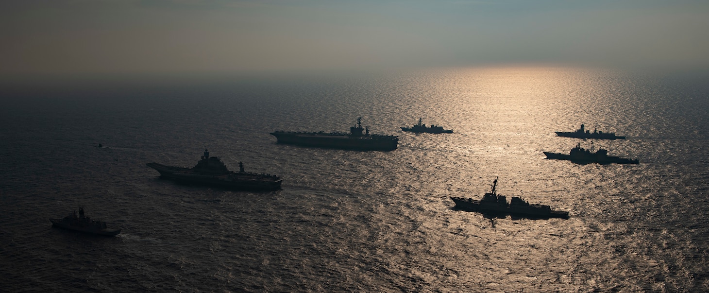 201117-N-NH257-1197 NORTH ARABIAN SEA (Nov. 17, 2020) Ships from the Royal Australian Navy, Indian Navy, Japanese Maritime Self-Defense Force, and the United States Navy participate in Malabar 2020. Malabar 2020 is the latest in a continuing series of exercises that has grown in scope and complexity over the years to address the variety of shared threats to maritime security in the Indo-Asia Pacific where the U.S. Navy has patrolled for more than 70 years promoting regional peace and security. Nimitz Carrier Strike Group is currently deployed to the 7th Fleet area of operations in support of a free and open Indo-Pacific. (U.S. Navy photo by Mass Communication Specialist 3rd Class Elliot Schaudt/Released)