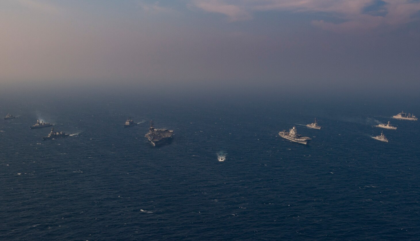 201117-N-NH257-1368 NORTH ARABIAN SEA (Nov. 17, 2020) Ships from the Royal Australian Navy, Indian Navy, Japanese Maritime Self-Defense Force, and the United States Navy participate in Malabar 2020. Malabar 2020 is the latest in a continuing series of exercises that has grown in scope and complexity over the years to address the variety of shared threats to maritime security in the Indo-Asia Pacific where the U.S. Navy has patrolled for more than 70 years promoting regional peace and security. Nimitz Carrier Strike Group is currently deployed to the 7th Fleet area of operations in support of a free and open Indo-Pacific. (U.S. Navy photo by Mass Communication Specialist 3rd Class Elliot Schaudt/Released)