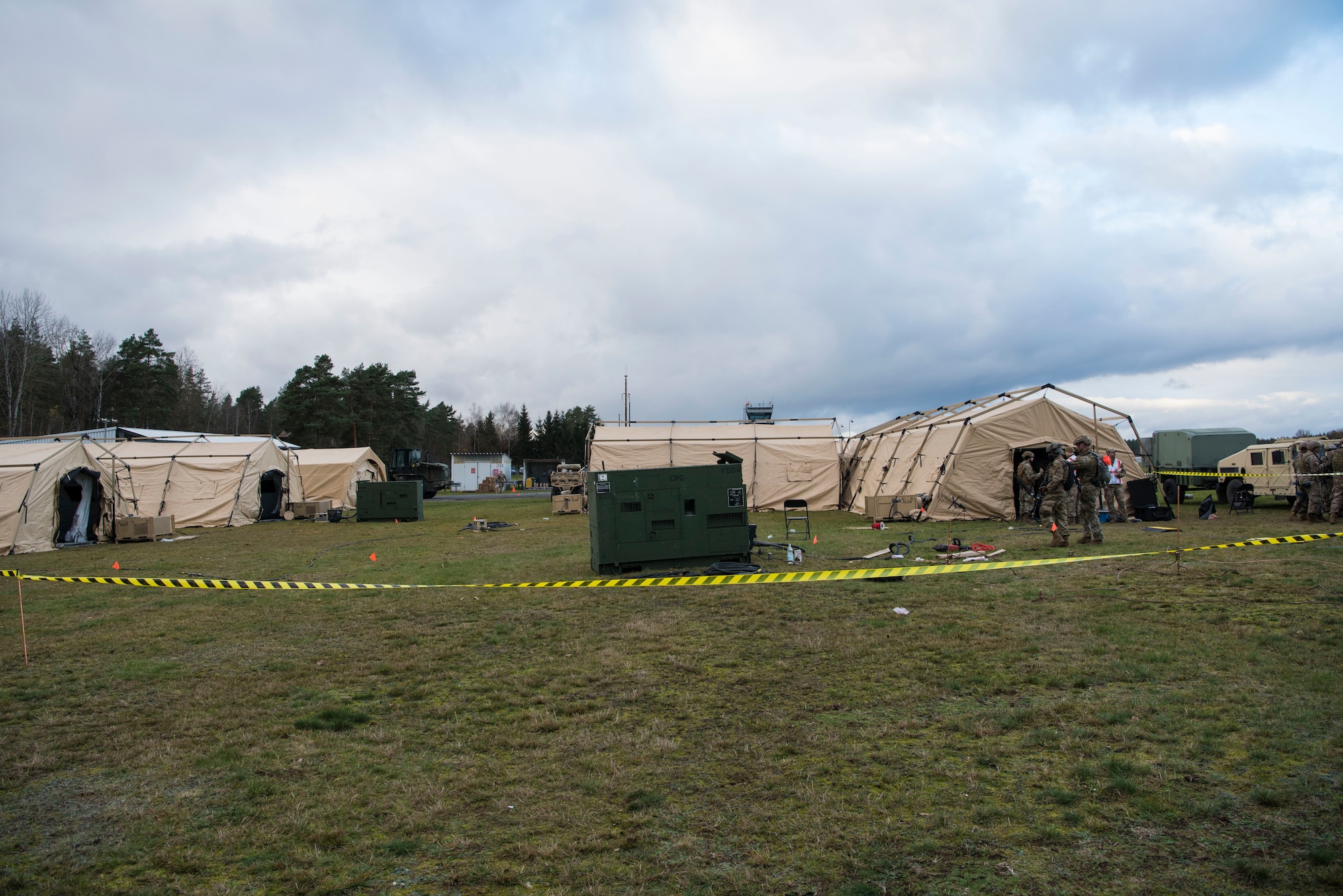 U.S. Airmen assigned to the 435th Contingency Response Group participate in a tent build-up during exercise Agile Wolf 21-01