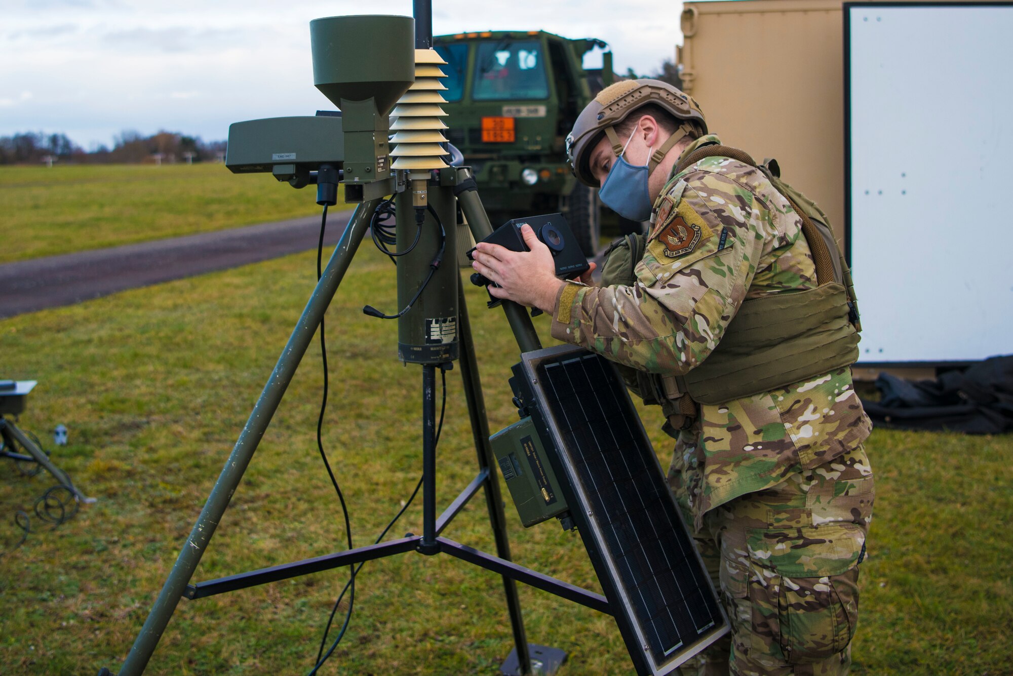 U.S. Air Force Staff. Sgt. John Baldelli, 435th Contingency Response Squadron weather forecaster, configures a tactical meteorological observing system as part of a base build-up during exercise Agile Wolf 21-01