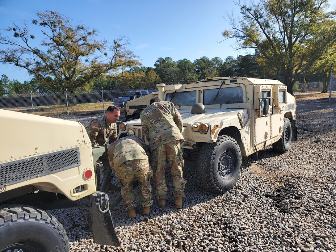 Soldiers with the 95th Civil Affairs Brigade prepare an excess vehicle for turn in at DLA Disposition Services’ Fort Bragg site Nov. 10.