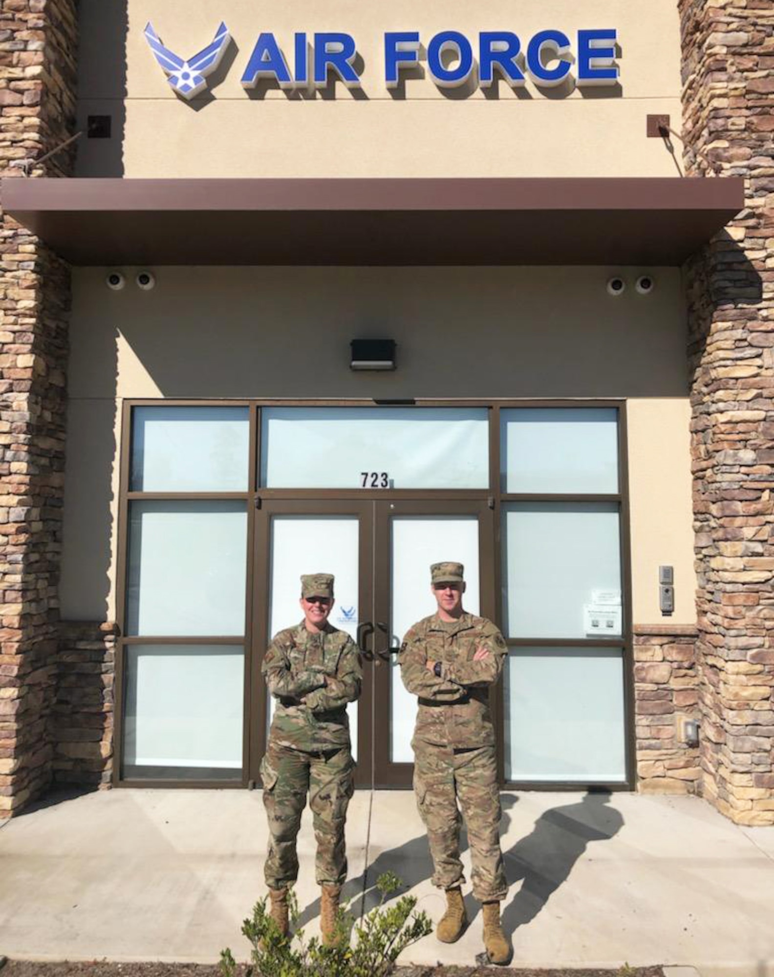 Tech. Sgt. Brittany Hopkins, a Georgia Air National Guard recruiter in Savannah and Augusta, Georgia, and Staff Sgt. Derek Knight, an enlisted accessions recruiter with the 336th Recruiting Squadron, show off their new office in Grovetown, Georgia