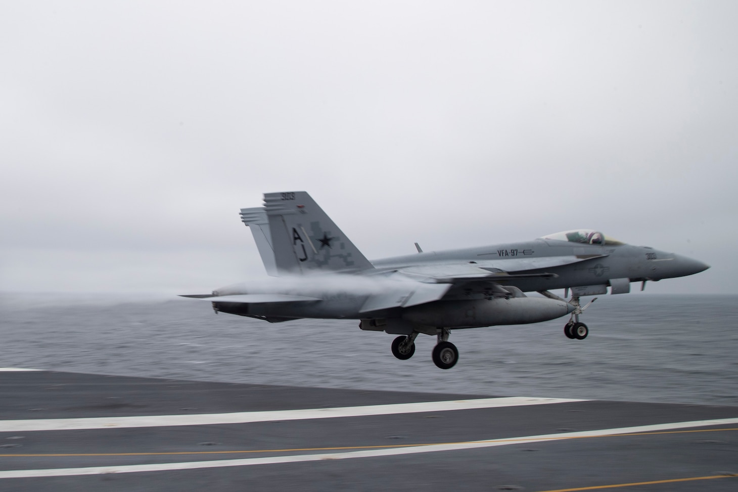 An F/A-18E Super Hornet attached to the "Warhawks" of Strike Fighter Squadron (VFA) 97, launches from the flight deck of the aircraft carrier USS Gerald R. Ford (CVN 78)., Nov. 13, 2020.