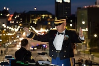 Chief Warrant Officer 4 Mark Mills leads the 151st Alabama National Guard Band at the Capital Christmas Tree Lighting Ceremony at the Sate Capita