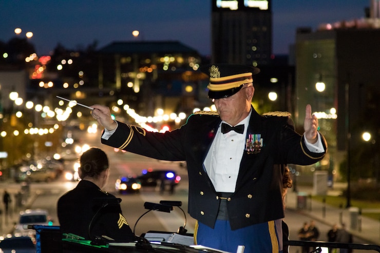 Chief Warrant Officer 4 Mark Mills leads the 151st Alabama National Guard Band at the Capital Christmas Tree Lighting Ceremony at the Sate Capita