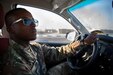 Army Sgt. Zjana Ray, from the 310th Construction Management Team based in Bullville, New York, drives between construction sites on November 5, 2020, Al Udeid Airbase, Qatar. Ray drives between 5 job sites for his job in theater as a member of Force Protection as the Army works to complete the Middle East Consolidation project.( Photo by U.S. Army Reserve Sgt. Jermaine Jackson)