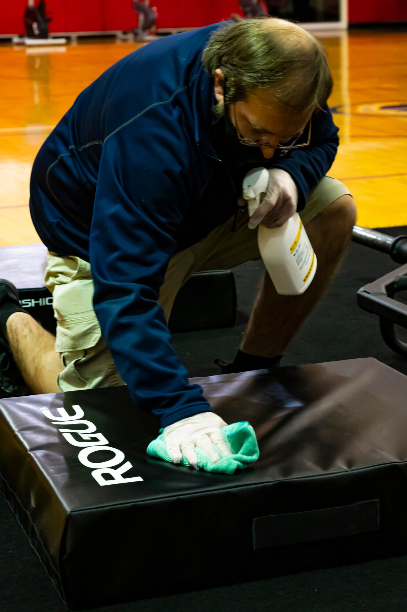 Alan Hill, 911th Force Support Squadron outdoor recreation assistant, sanitizes a foam mat at the Pittsburgh International Airport Air Reserve Station, Pennsylvania, Nov. 19, 2020.