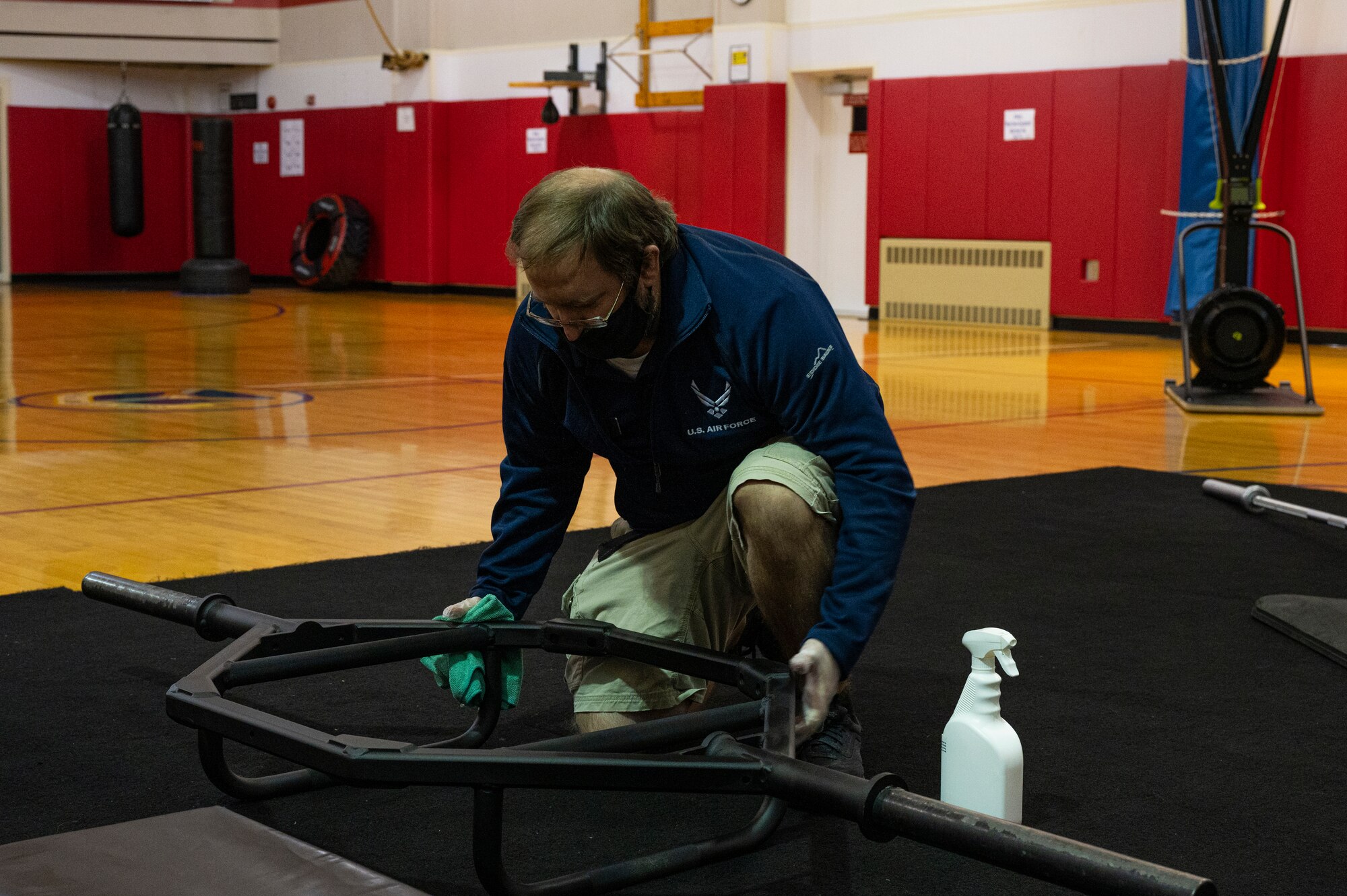 Alan Hill, 911th Force Support Squadron outdoor recreation assistant, sanitizes gym equipment at the Pittsburgh International Airport Air Reserve Station, Pennsylvania, Nov. 19, 2020.