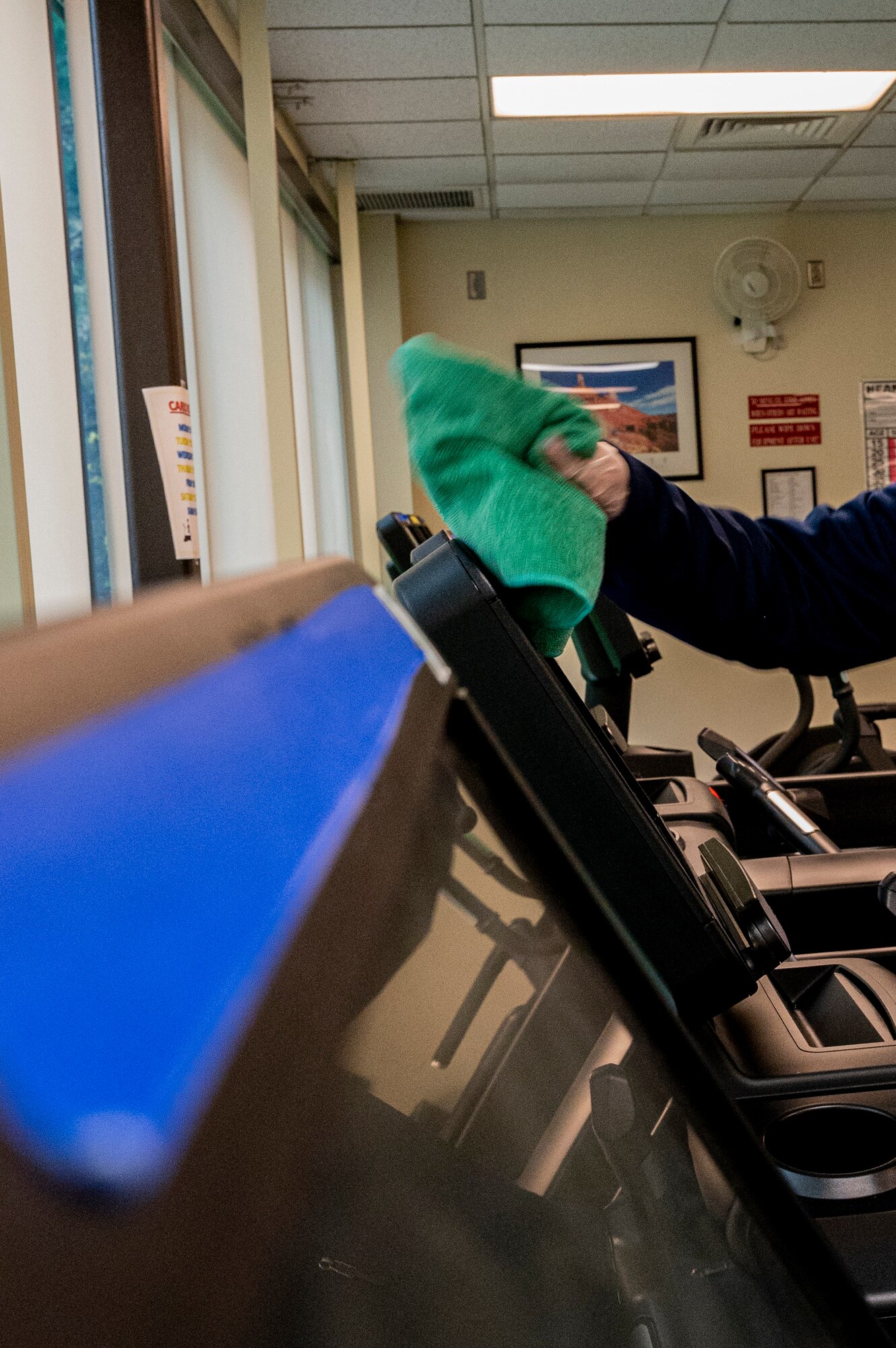 Alan Hill, 911th Force Support Squadron outdoor recreation assistant, sanitizes a treadmill at the Pittsburgh International Airport Air Reserve Station, Pennsylvania, Nov. 19, 2020.