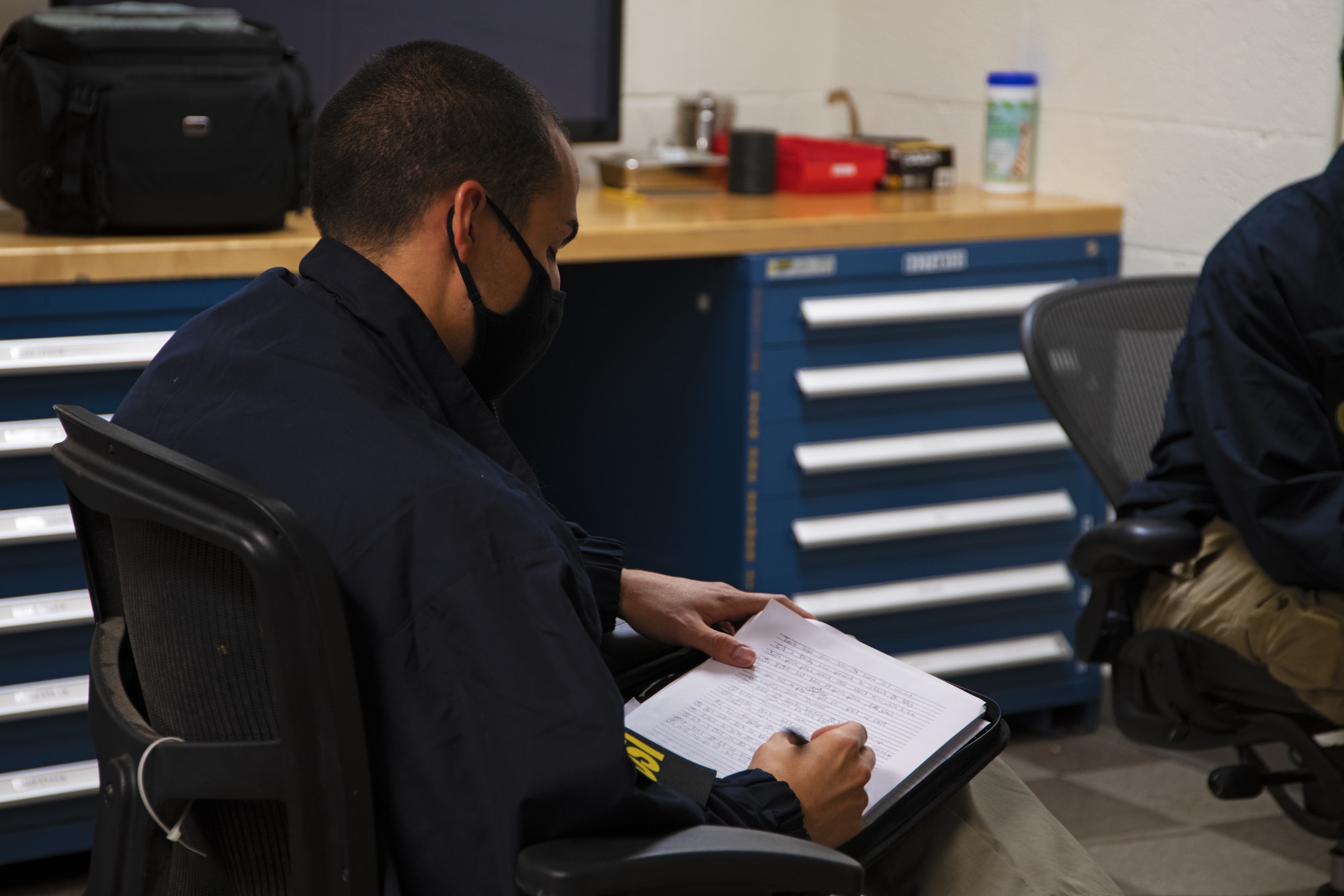 U.S. Air Force Special Agent Eduardo Perez-Cabon, Detachment 331 Office of Special Investigations, writes down the victim role-player’s statement at Joint Base Andrews, Md., Oct. 30, 2020. Statements are needed to understand the interviewee’s perspective.